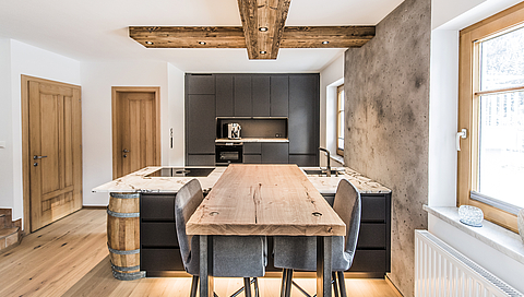 A unique kitchen with a cask and souvenirs from Mont Blanc