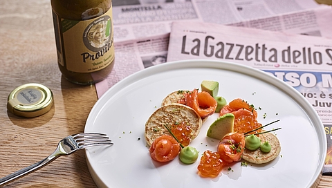 Buckwheat blinis with marinated salmon, caviar and avocado