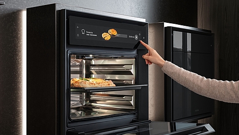 BORA_SignatureKitchen2025_X_BO_open_with_hand_DE.jpg