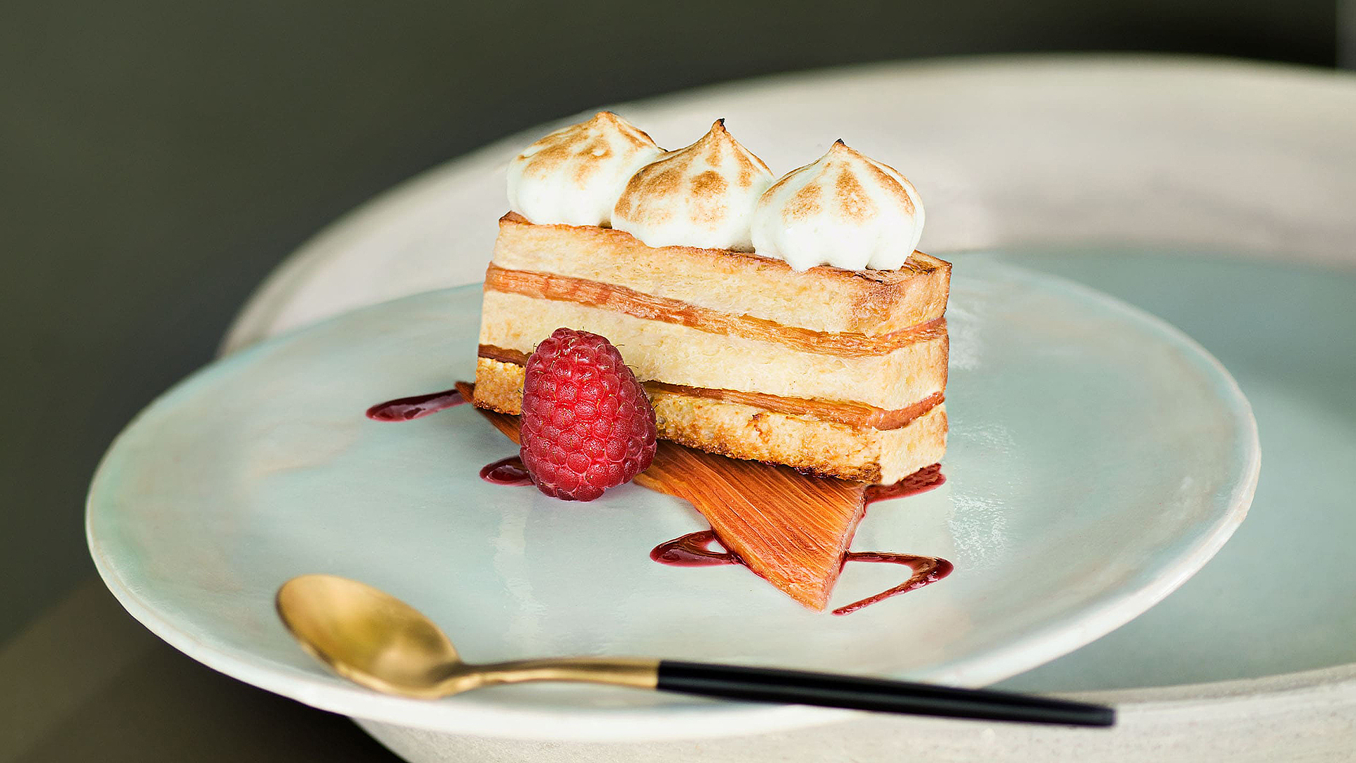 Brioche pudding with rhubarb and raspberries