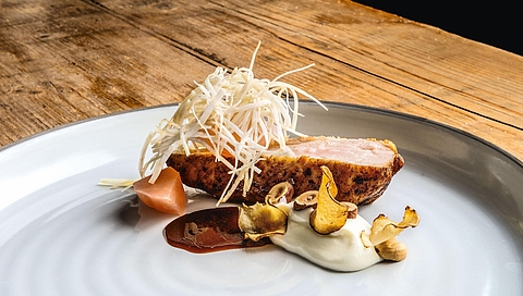 Breast of guinea fowl with a honey glaze, celeriac, apples and hazelnuts