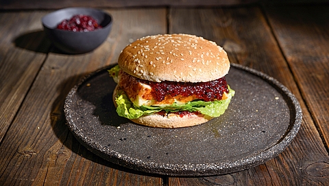 Halloumi burger with cranberry and maple sauce and lettuce