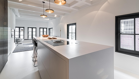 Minimalist loft surrounded by canals