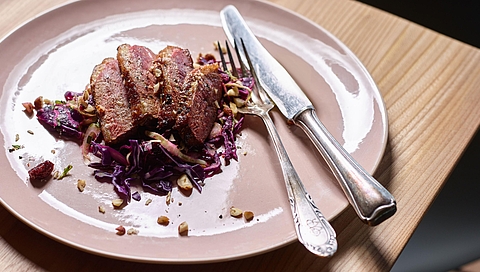 Duck breast on red cabbage salad