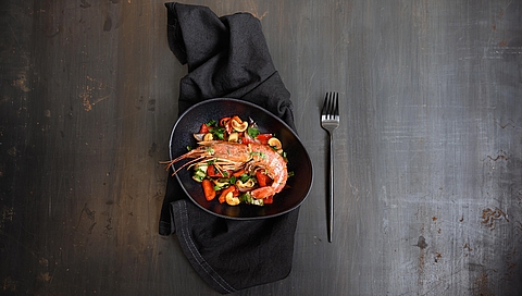 Prawns on Chinese vegetables with cashew nuts and coriander