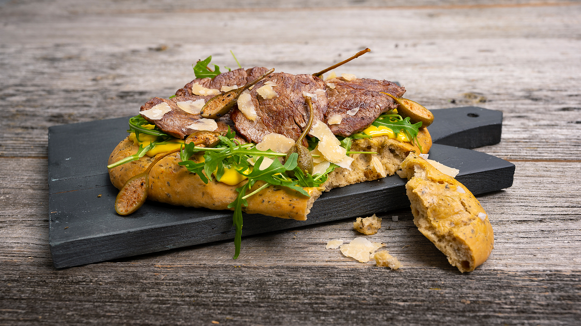 Straccetti on spelt and rosemary focaccia with Parmesan and truffle mayonnaise Straccetti on spelt and rosemary focaccia with Parmesan and truffle mayonnaise
