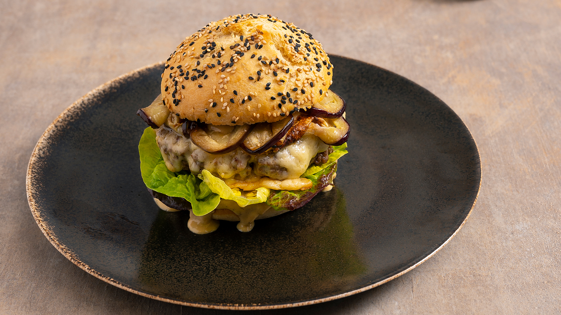 Handcrafted beef burger with burger relish in a spelt brioche bun