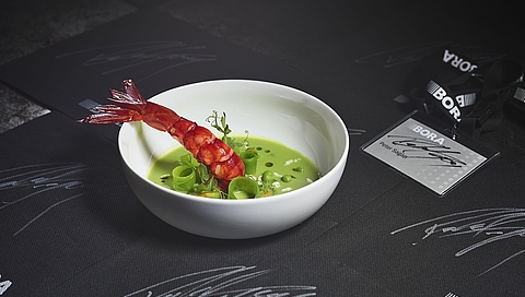 Pea & matcha tea soup with grilled prawns