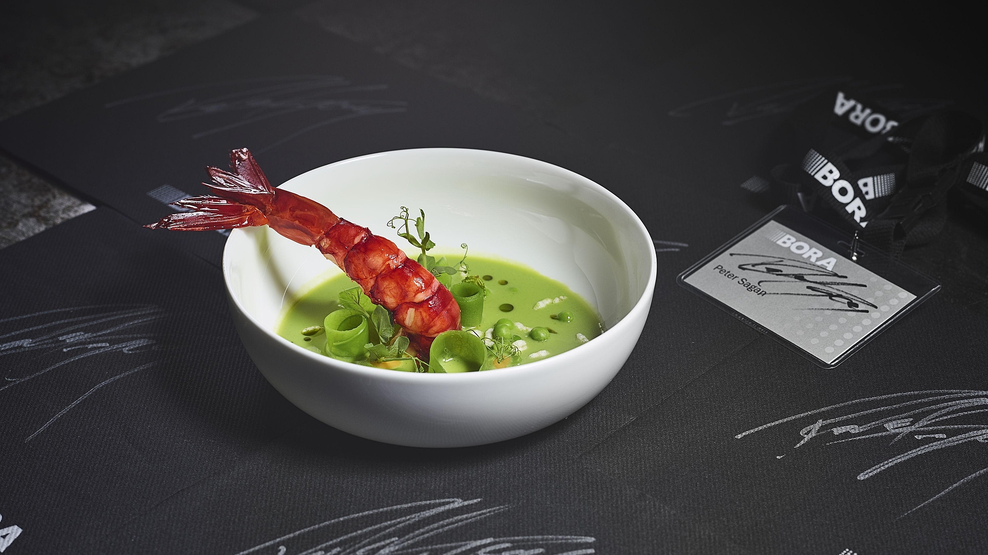 pea and matcha tea soup with grilled prawns