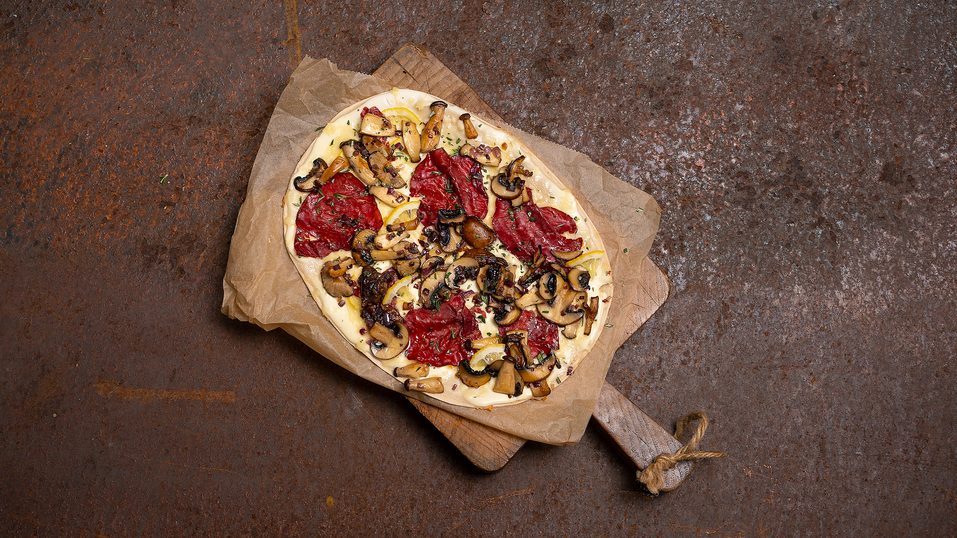 Tarte flambée with mushrooms and cheese