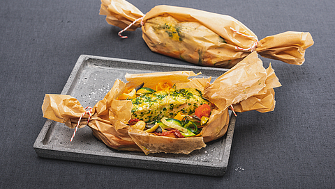 Pollock en papillote with vegetables