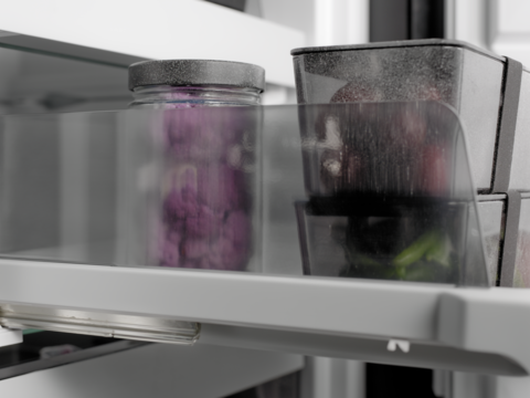 BORA Küchenschublade mit transparenten Aufbewahrungsboxen für Gewürze und Lebensmittel, geöffnete Schublade in moderner Küche.