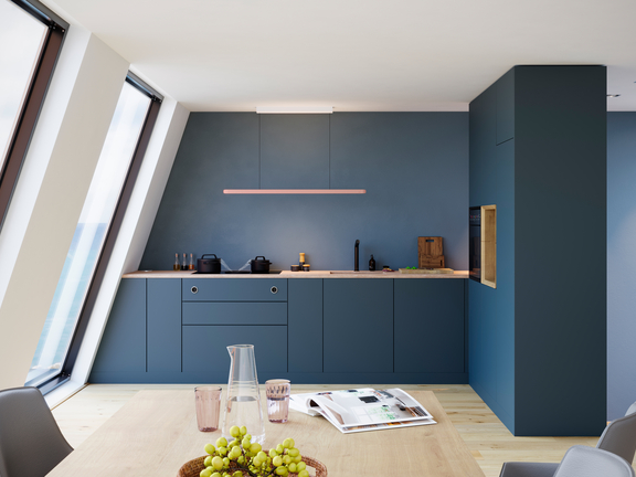 Moderne Küchenzeile mit BORA Kochfeldabzug und matten blauen Fronten in hellen, lichtdurchfluteten Raum mit Esstisch. Moderne Küchenzeile mit BORA Kochfeldabzug und matten blauen Fronten in hellen, lichtdurchfluteten Raum mit Esstisch.